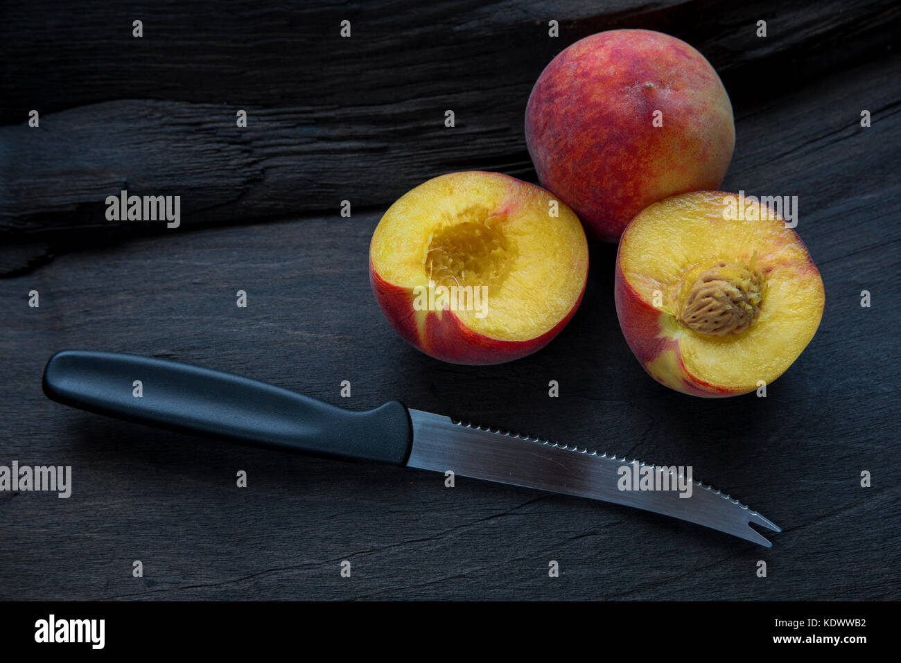 THe Peach cut in half Stock Photo Alamy