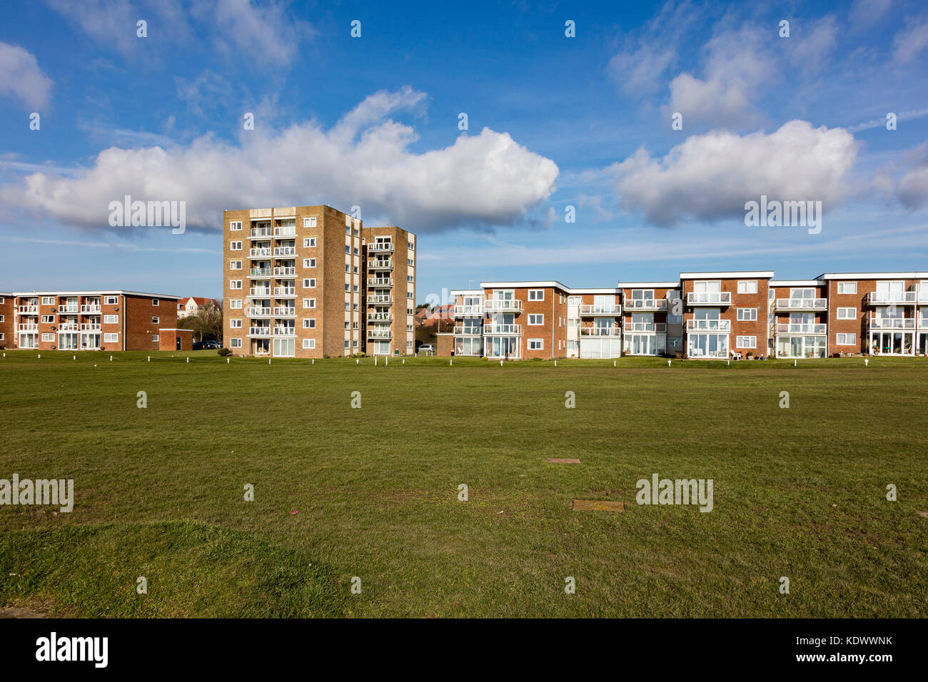 Blocks of flats on Bexhill seafront under a blue sky, Bexhill on Sea