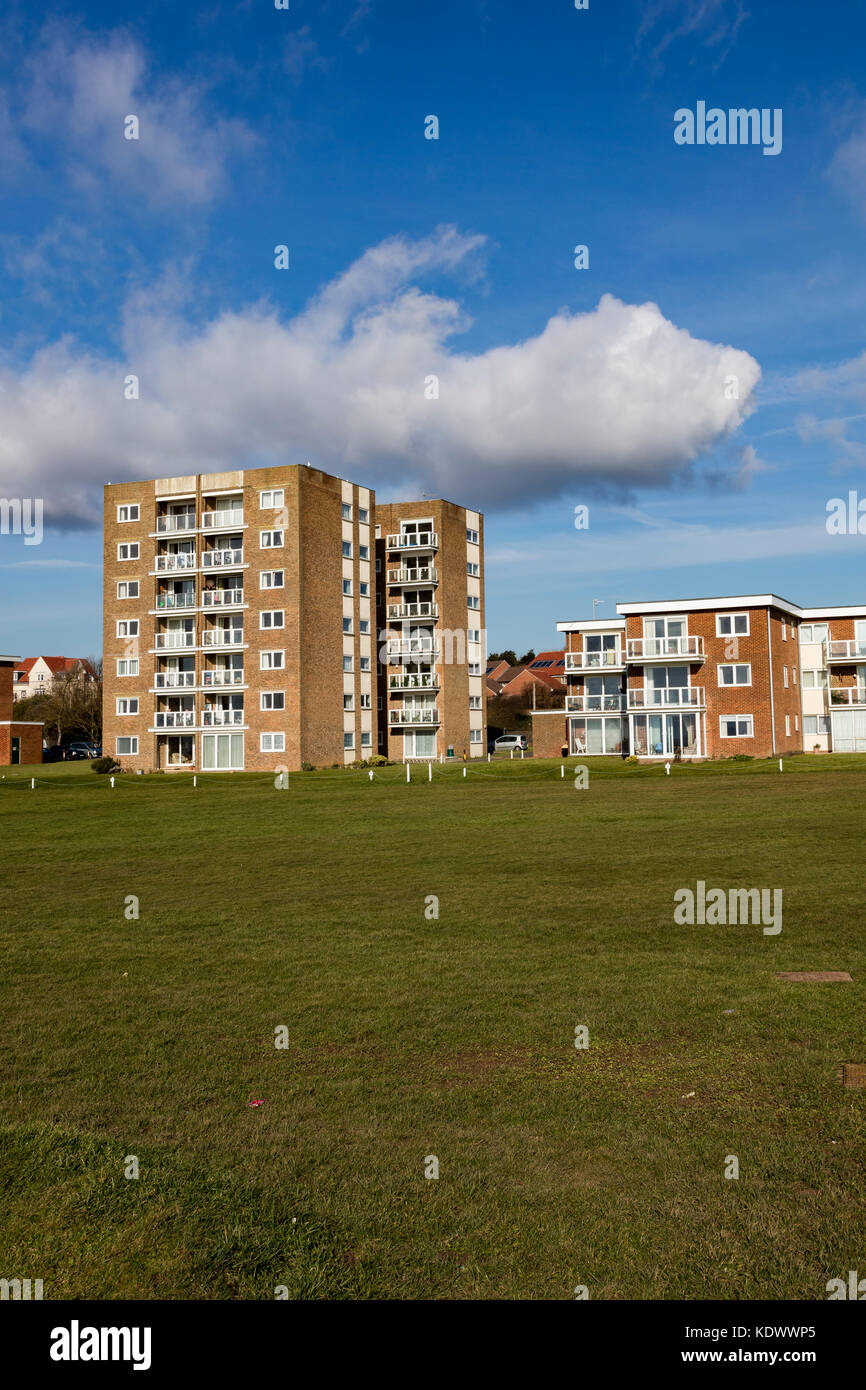 Blocks of flats on Bexhill seafront under a blue sky, Bexhill on Sea