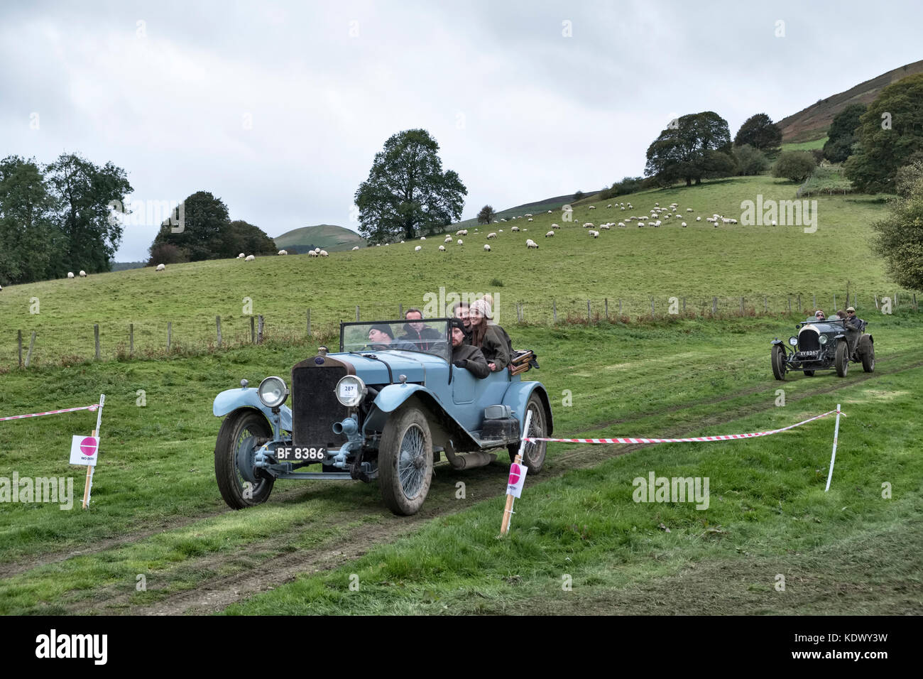 A meeting of the Vintage Sports-Car Club (VSCC) at Badlands Farm, Kinnerton, mid-Wales, UK. A 1928 Delage DR70 followed by a 1925 Bentley Stock Photo