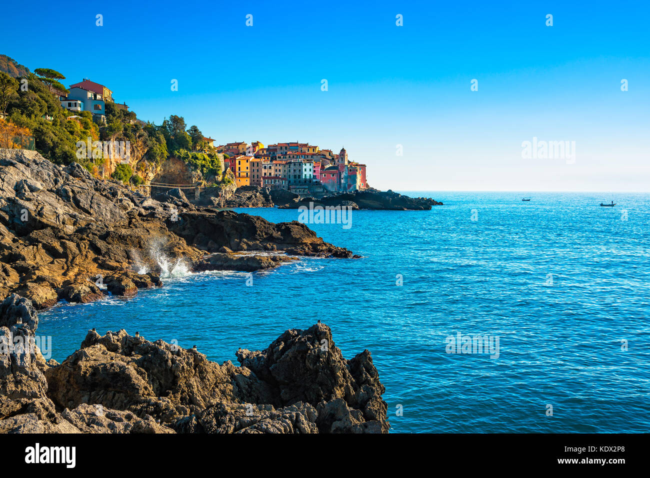 Tellaro rocks and old village on the sea. Church and houses. Five lands