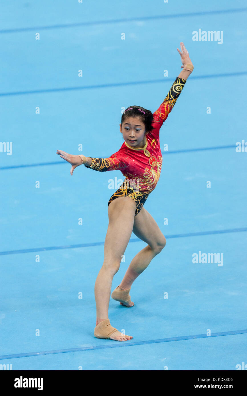 Yuyuan Jiang (CHN) competing on the floor during Women's Individual All Around Gymnastics at the 2008 Olympic Summer Games, Beijing, China Stock Photo