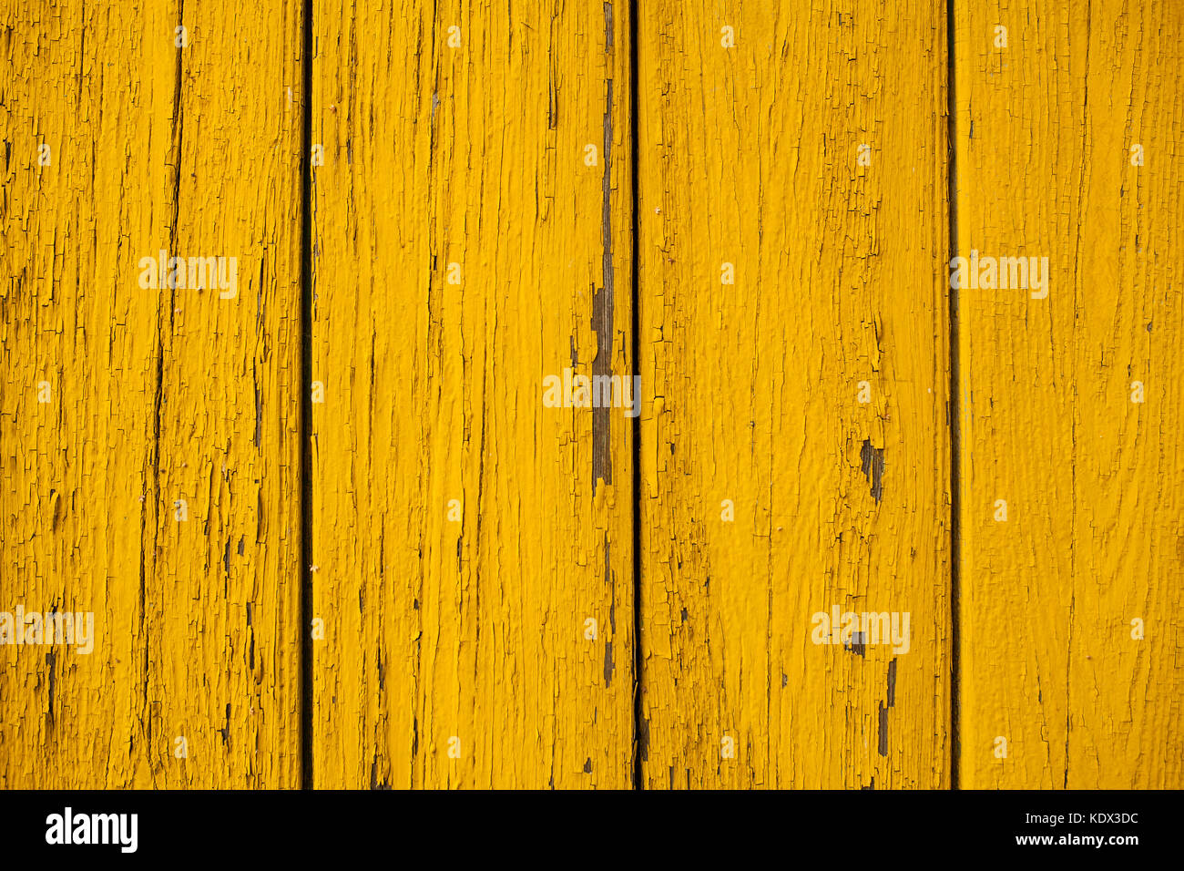 Vintage background from a wooden shabby yellow plank. Toned image Stock ...