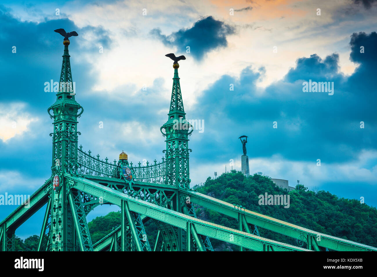 Budapest skyline, view of the eagle-topped towers of the Szabadsag Bridge and the Liberation Monument on top of Gellert Hegy (hill), Budapest. Stock Photo