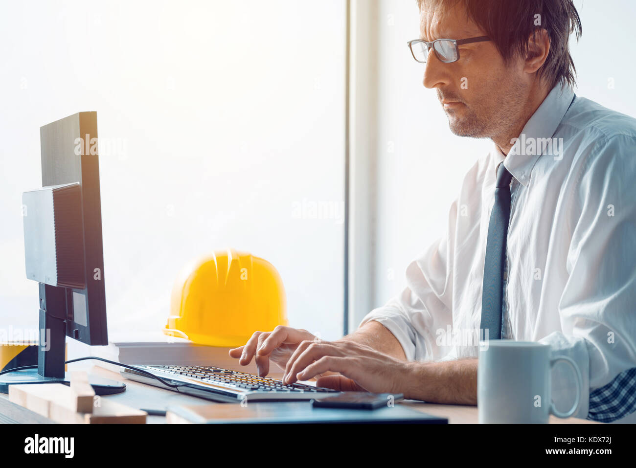Architect At Computer