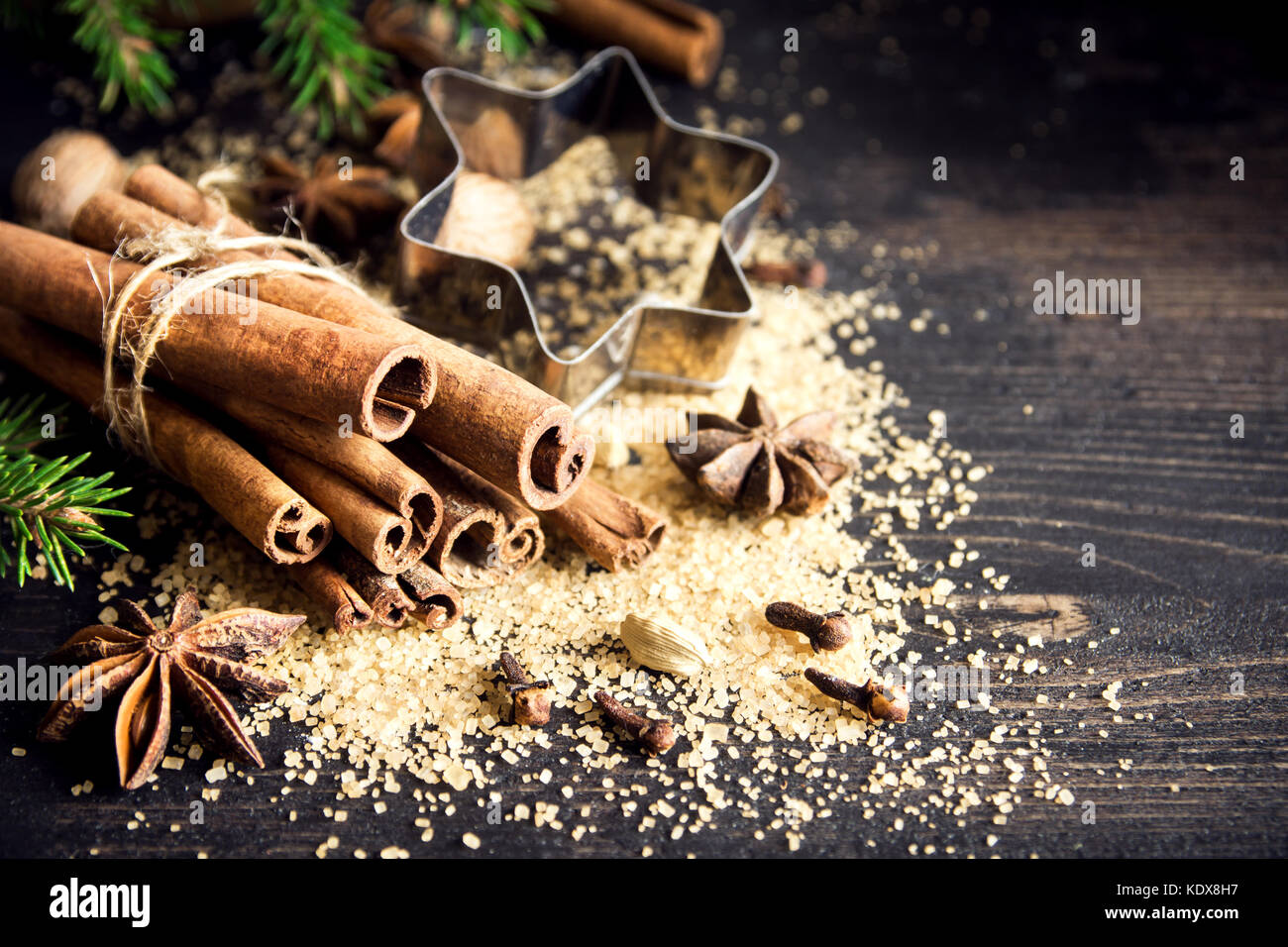 Christmas spices and baking ingredients. Cinnamon sticks, anise stars