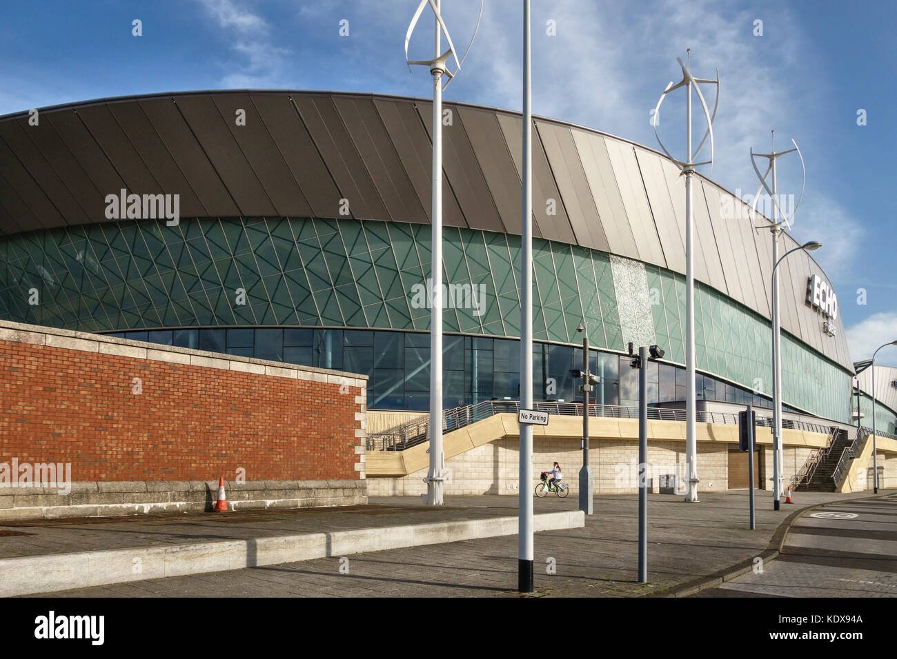 Liverpool, UK. Vertical axis wind turbines help power the Echo Arena (2008), on the River Mersey waterfront on the site of the old King's Dock Stock Photo