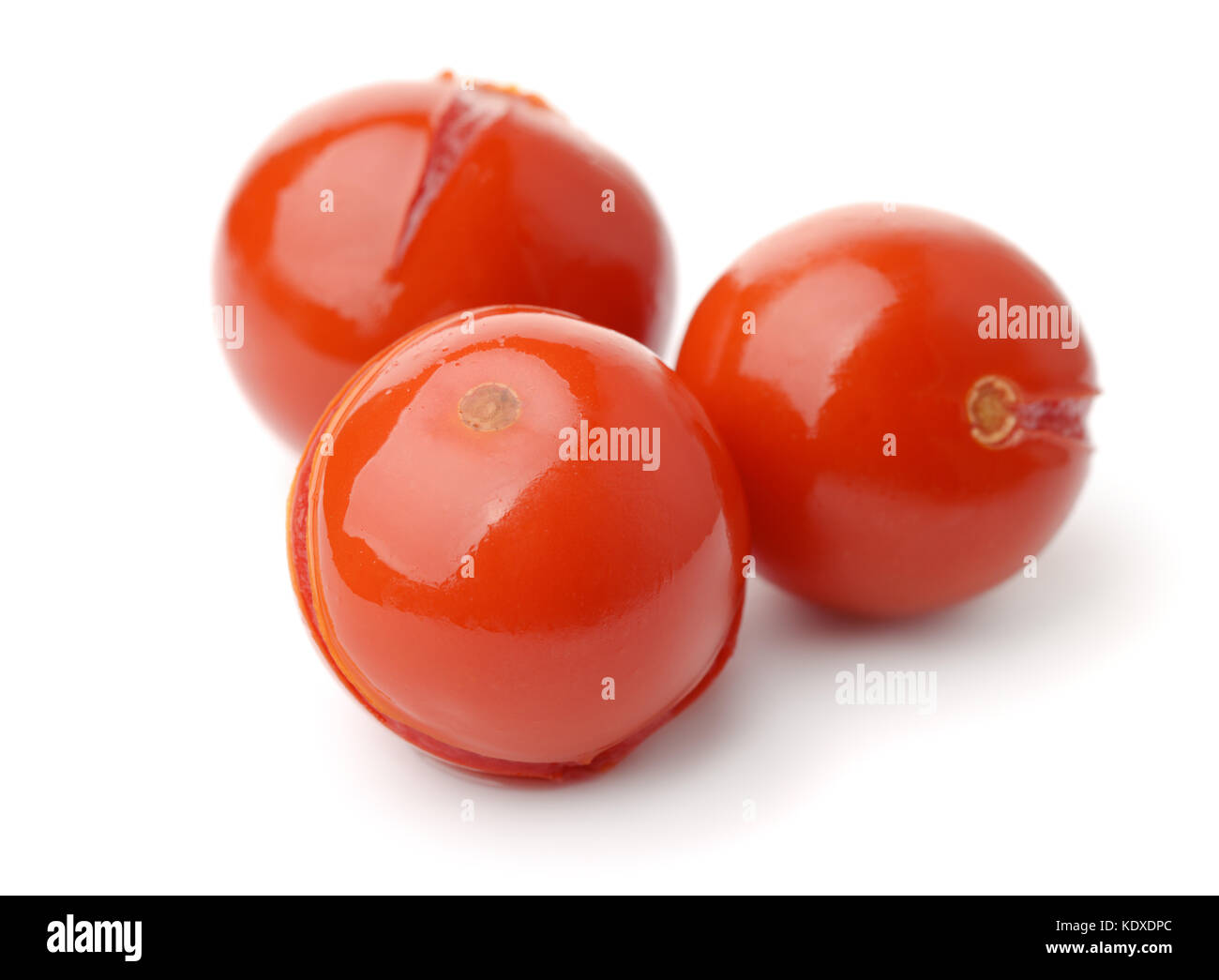 Pickled tomatoes isolated on white Stock Photo