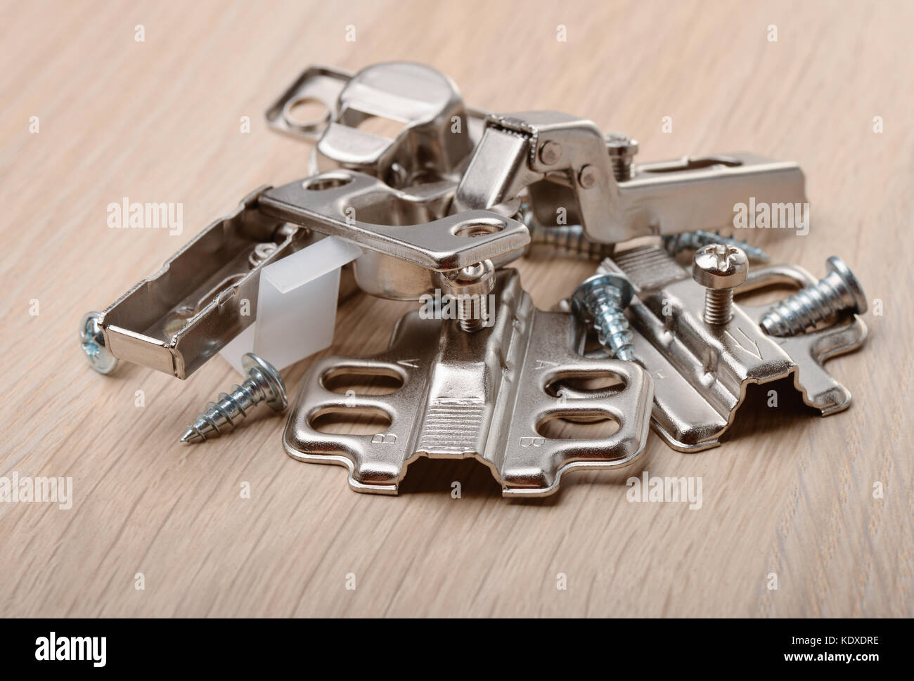 Close up of furniture fittings on furniture board Stock Photo Alamy