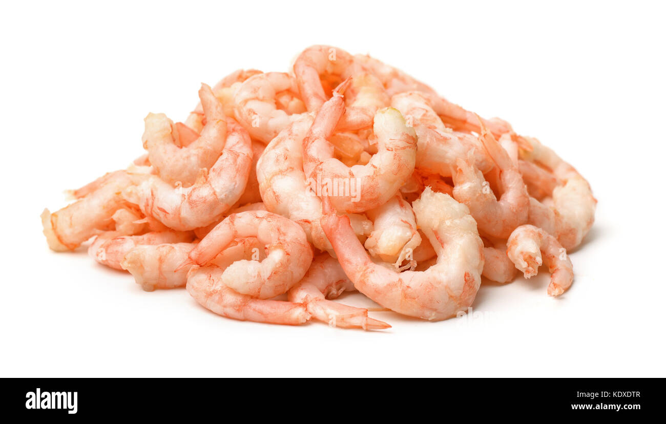 Pile of boiled peeled  shrimps isolated on white Stock Photo