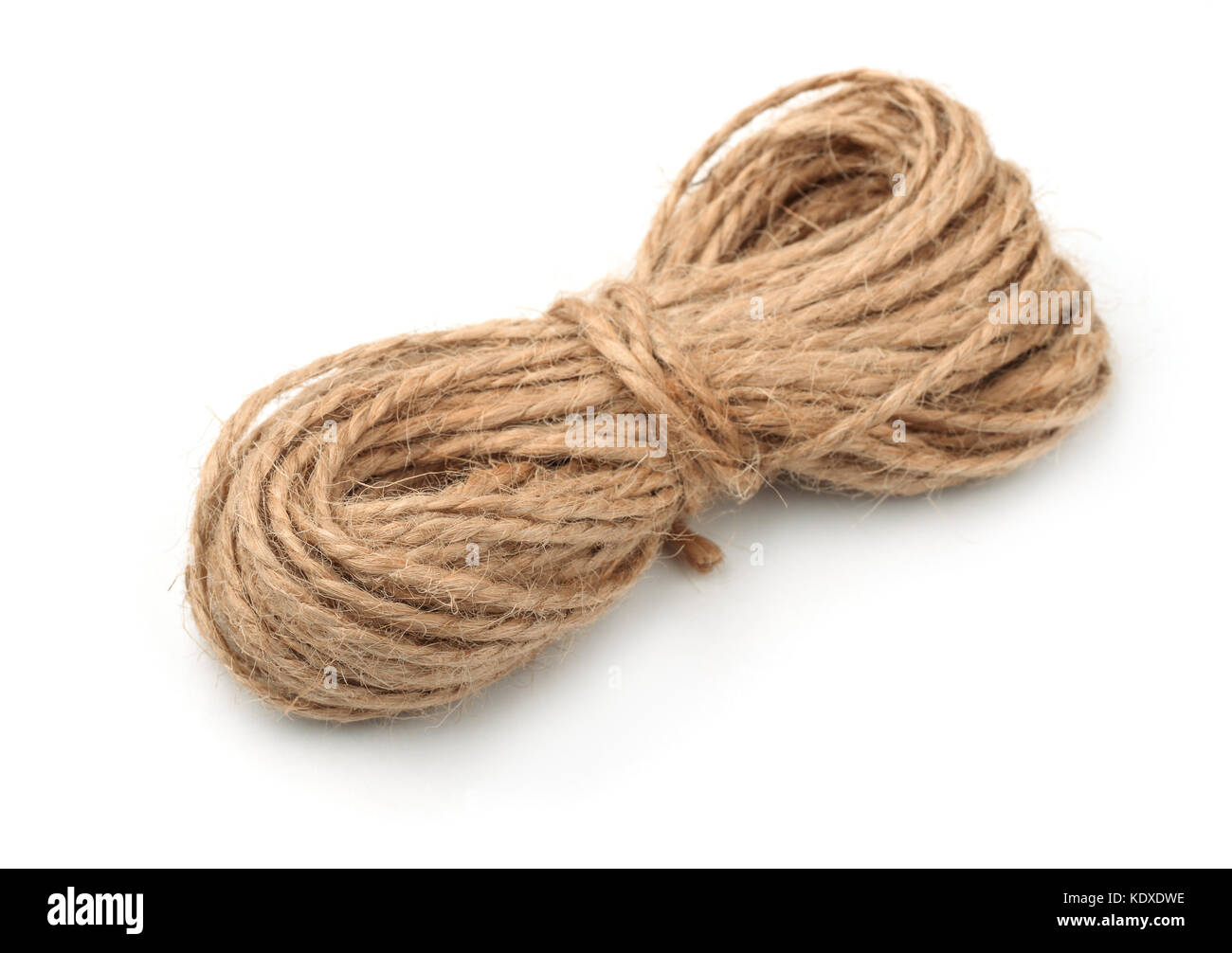 Skein of natural jute twine isolated on white Stock Photo