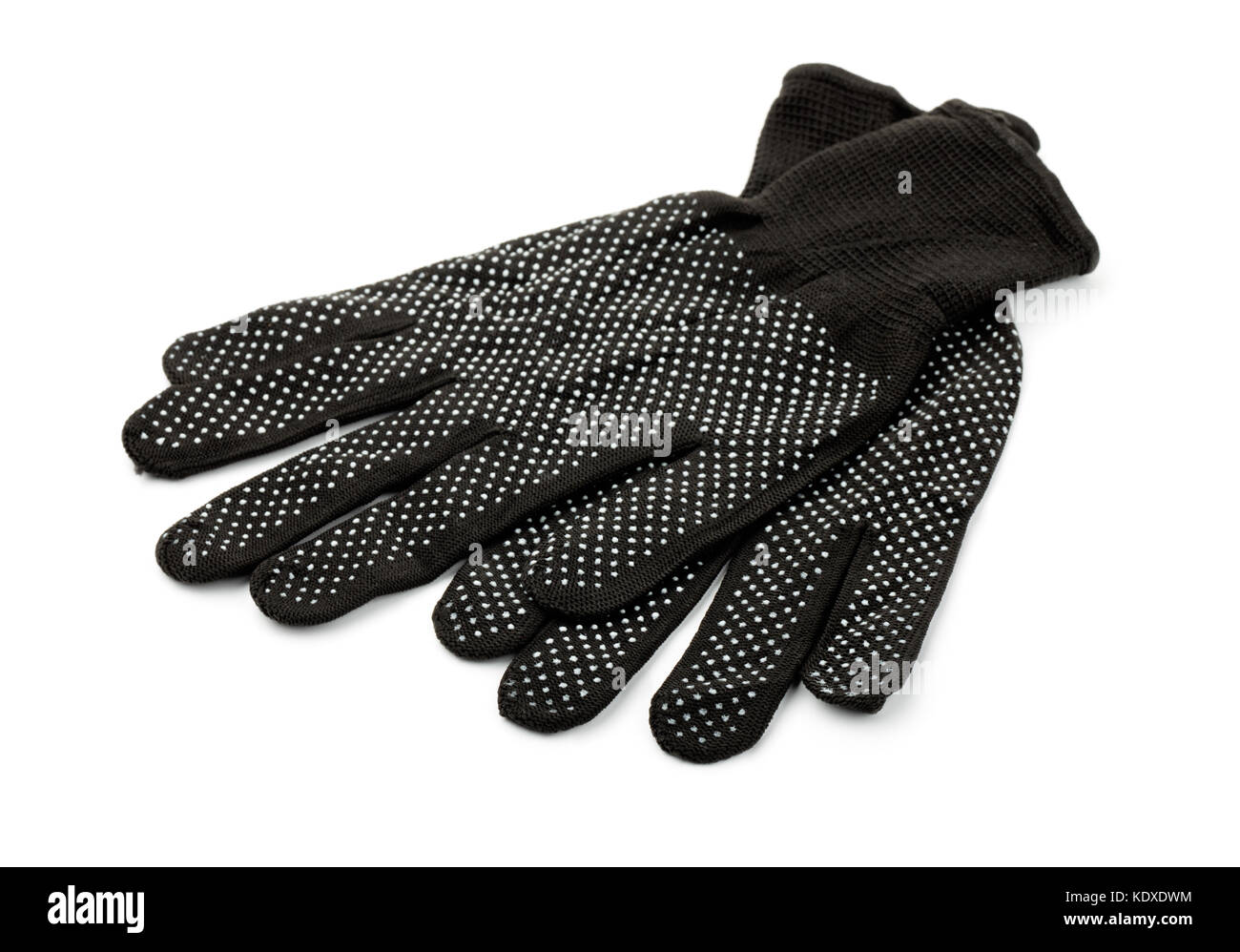 Pair of PVC dotted black cotton gloves isolated on whiye Stock Photo
