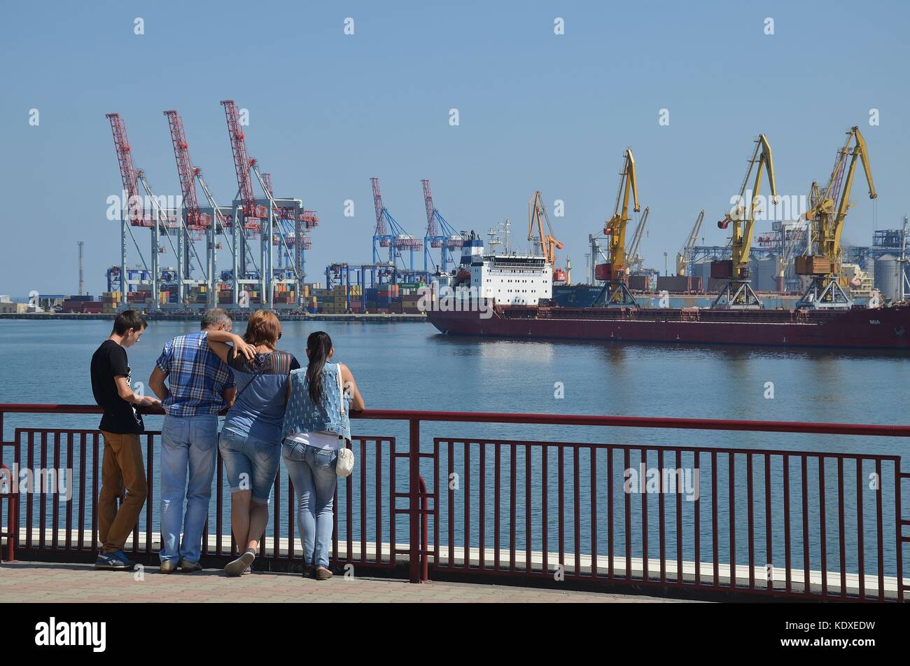 A family standing at the Harbour of Odessa, Ukraine Stock Photo