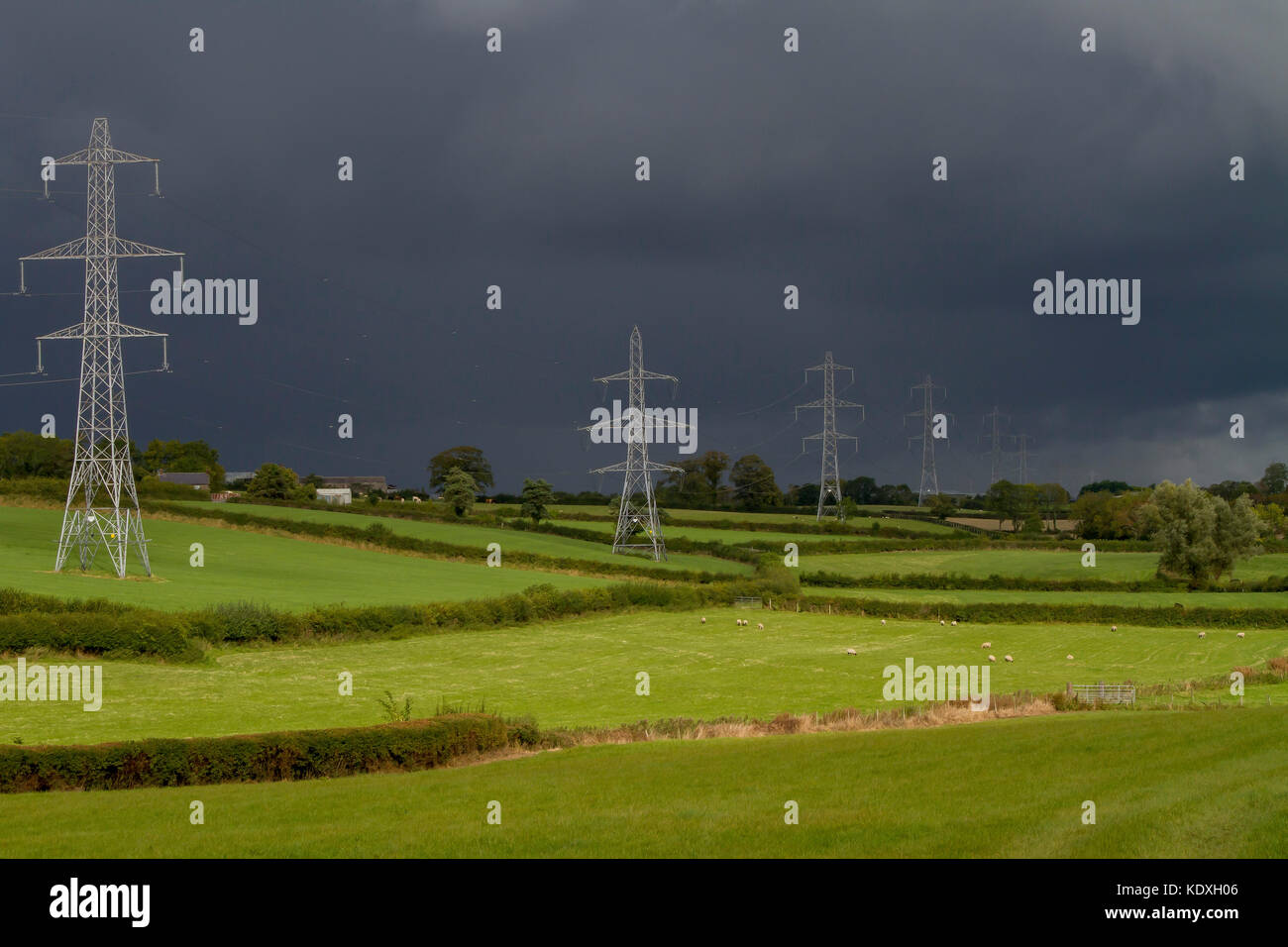 Overhead electricity power-lines and pylons in County Armagh, Northern Ireland. Stock Photo