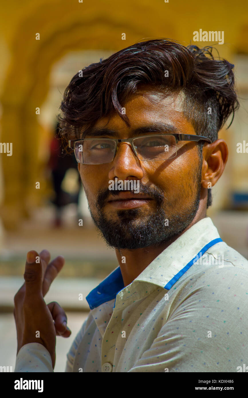 Amber, India - September 19, 2017: Portrait of an unidentified Indian man with beard and wearing glasses on the streets of Amber, India Stock Photo