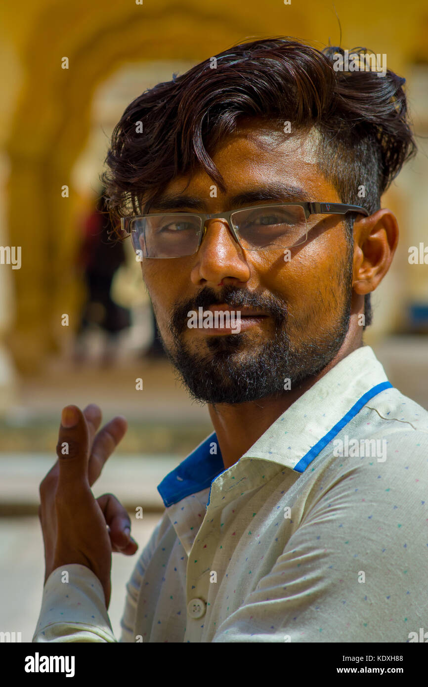 Amber, India - September 19, 2017: Portrait of an unidentified Indian man with beard and wearing glasses on the streets of Amber, India Stock Photo