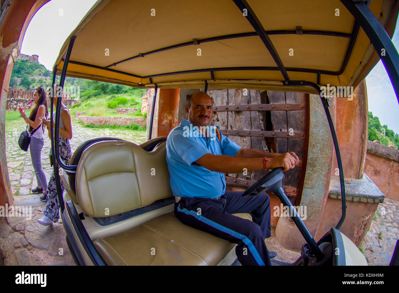 Amer, India - September 21, 2017: A driver in an empty rickshaw in Jaipur Stock Photo