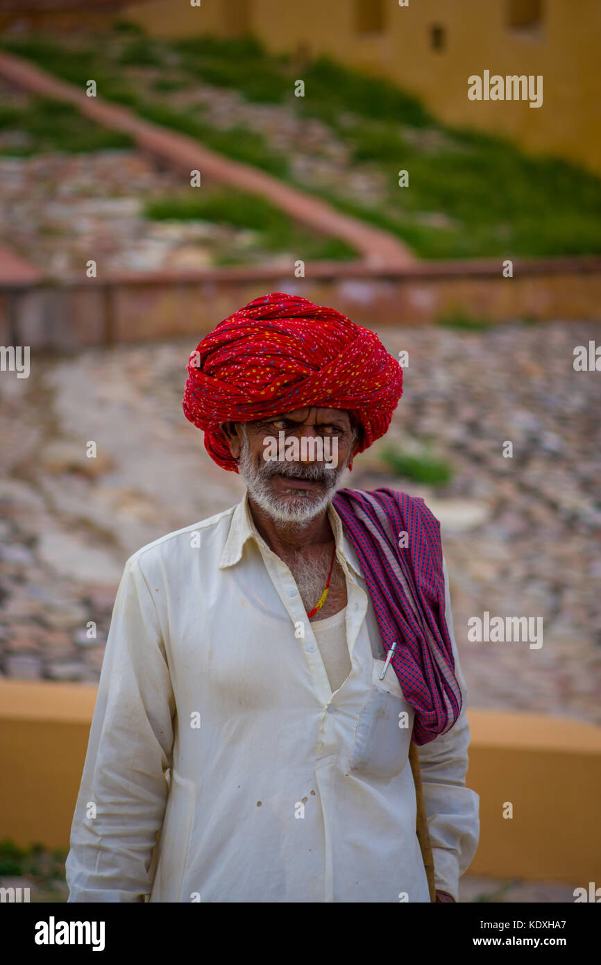 Jaipur, India - September 19, 2017: Close up of an unidentified Indian man with beard, wearin a red turban on the streets of Jaipur, India Stock Photo