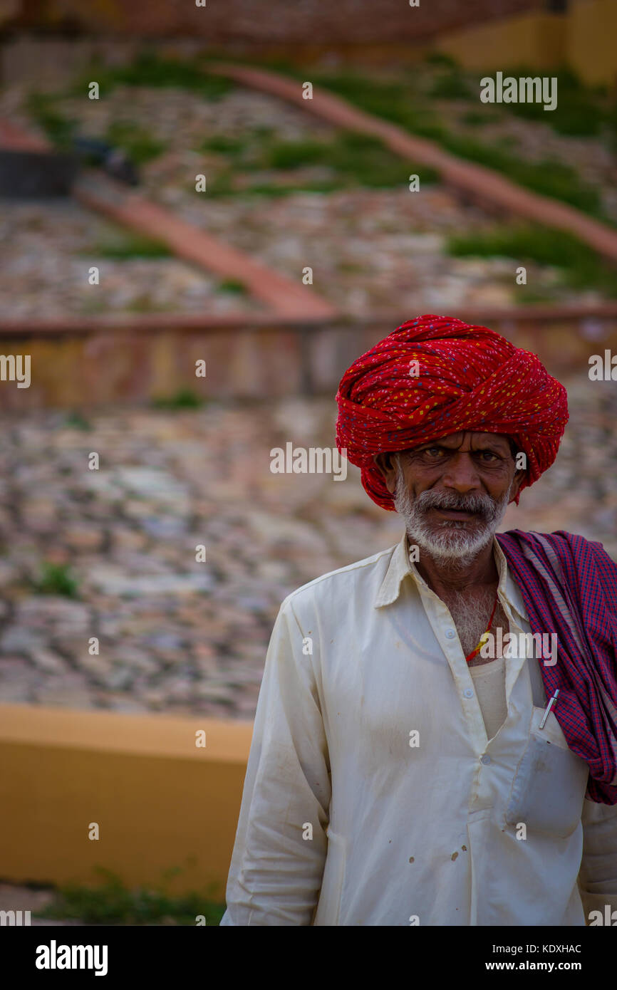 Jaipur, India - September 19, 2017: Close up of an unidentified Indian man with beard, wearin a red turban on the streets of Jaipur, India Stock Photo
