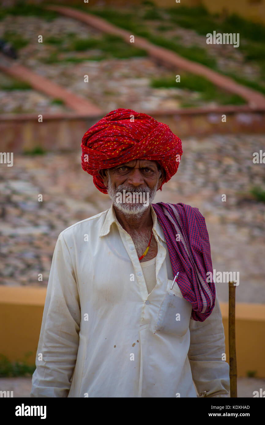Jaipur, India - September 19, 2017: Close up of an unidentified Indian man with beard, wearin a red turban on the streets of Jaipur, India Stock Photo