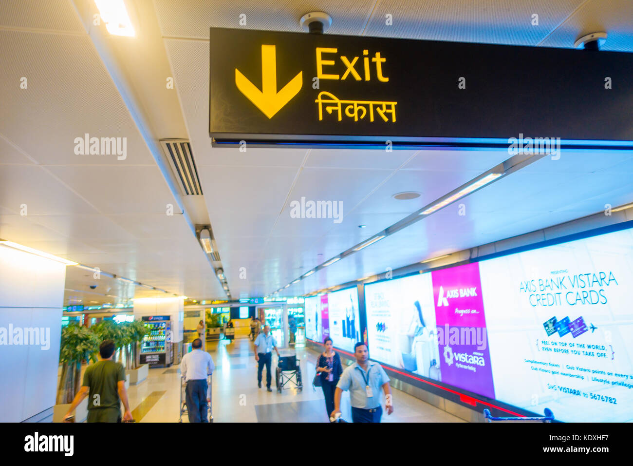 DELHI, INDIA - SEPTEMBER 19, 2017: Informative sign of exit in the International Airport of Delhi, Indira Gandhi International Airport is the 32th busiest in the world Stock Photo