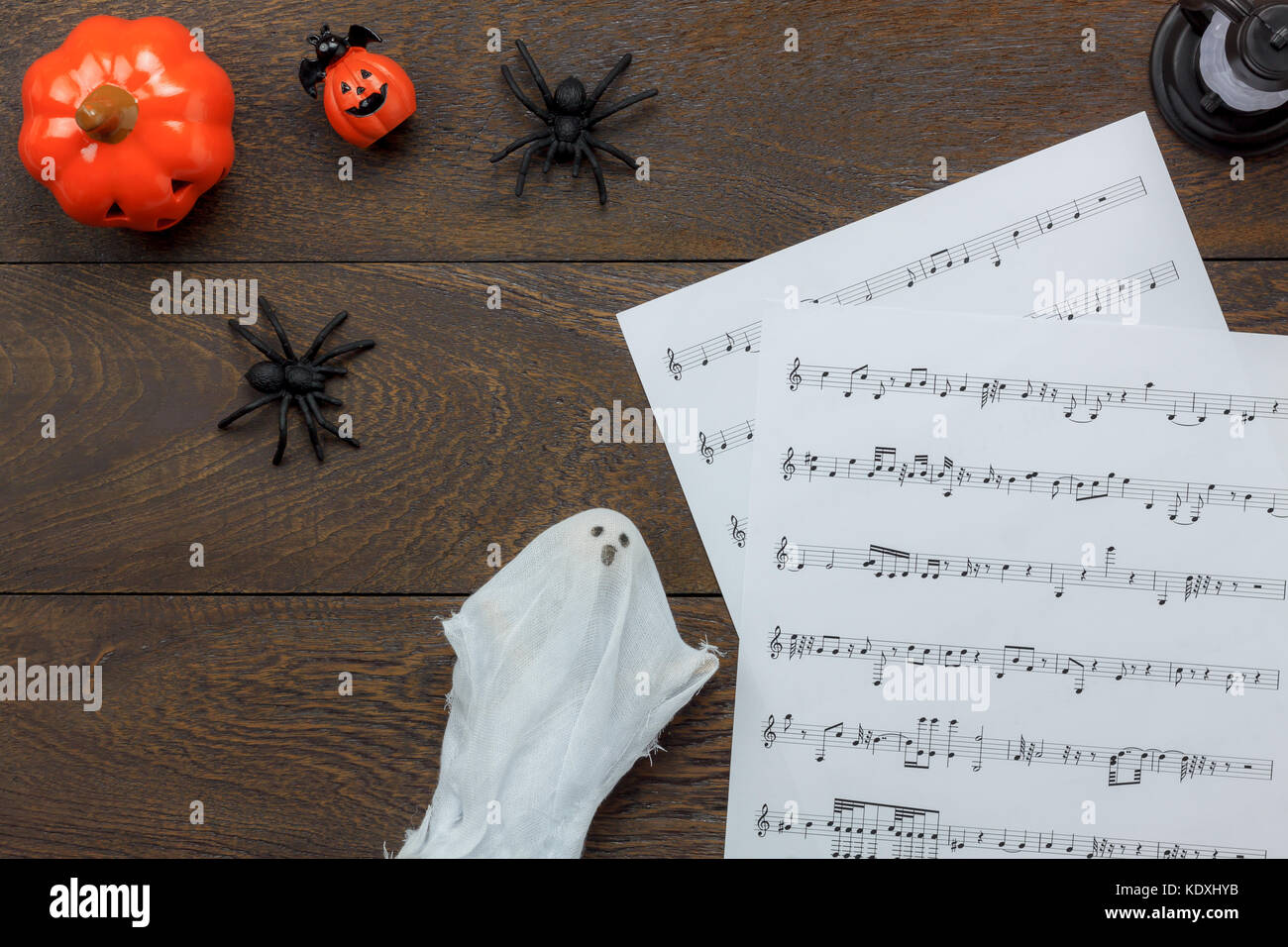 Top view of Happy Halloween Festival and music note sheet background