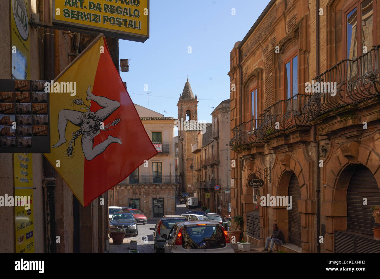 A view of the town of Piazza Armerina with a Sicilian flag in the foreground. From a series of travel photos in Sicily, Italy. Photo date: Thursday, O Stock Photo
