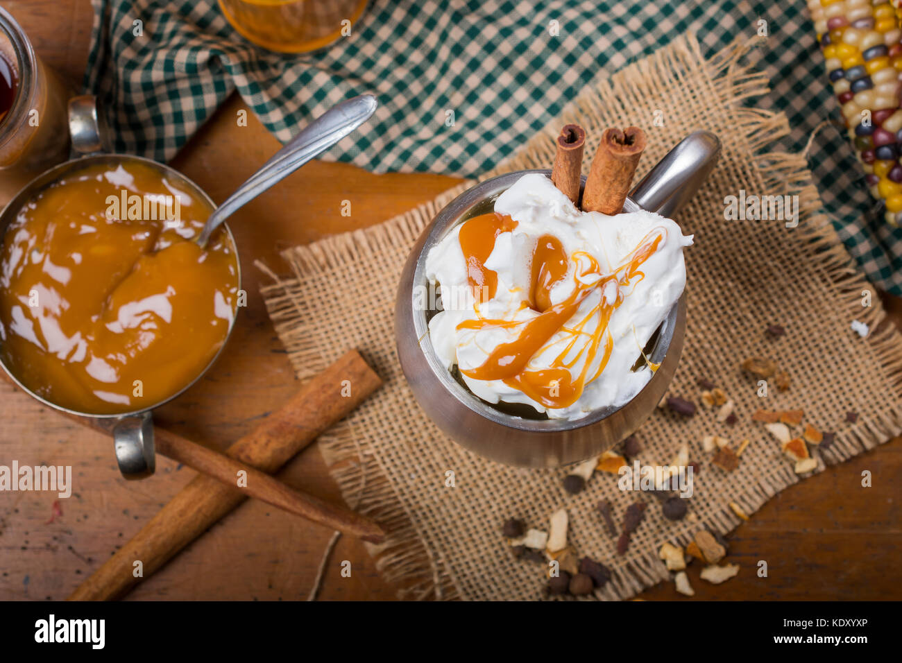 Top view of cup with whipped cream and caramel drizzled on top with