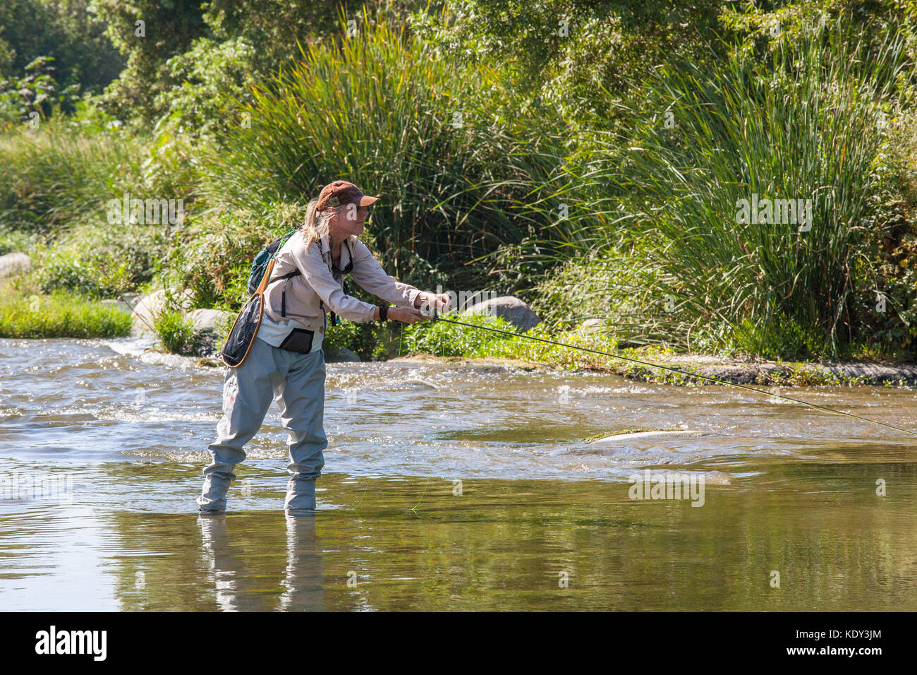 Experienced anglers, kids and those wishing to learn to fish attend The first annual Off tha’ Hook fly fishing event held on September 6, 2014 on the  Stock Photo