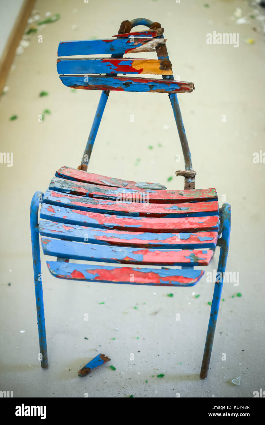 Close up of a broken wooden colorful chair Stock Photo Alamy