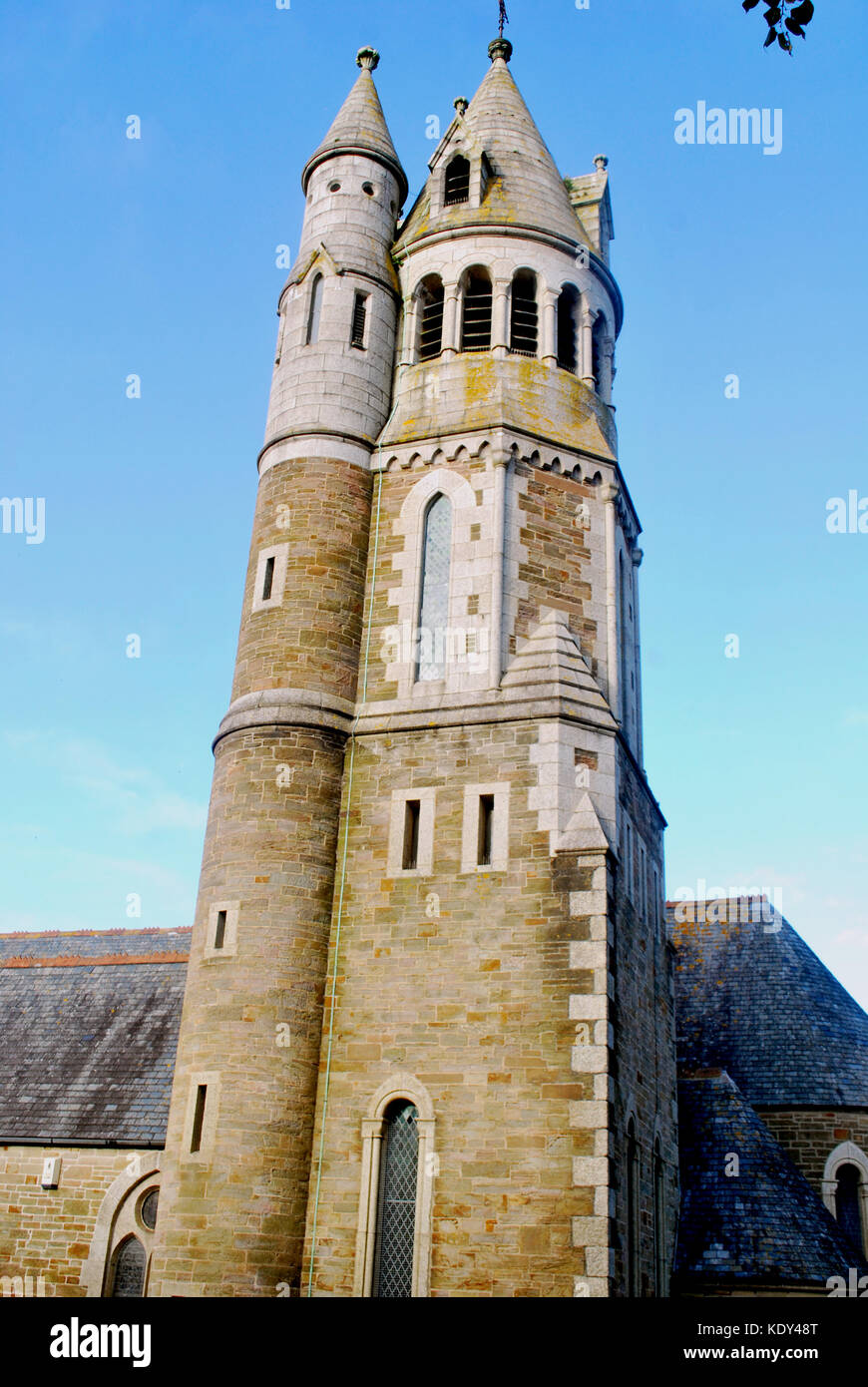 Church tower in front of a clear blue sky Stock Photo - Alamy