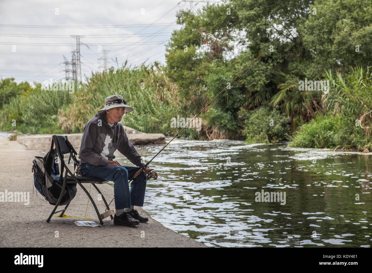 Fishing along the Los Angeles River, Elysian Valley, Los Angeles, California, USA Stock Photo