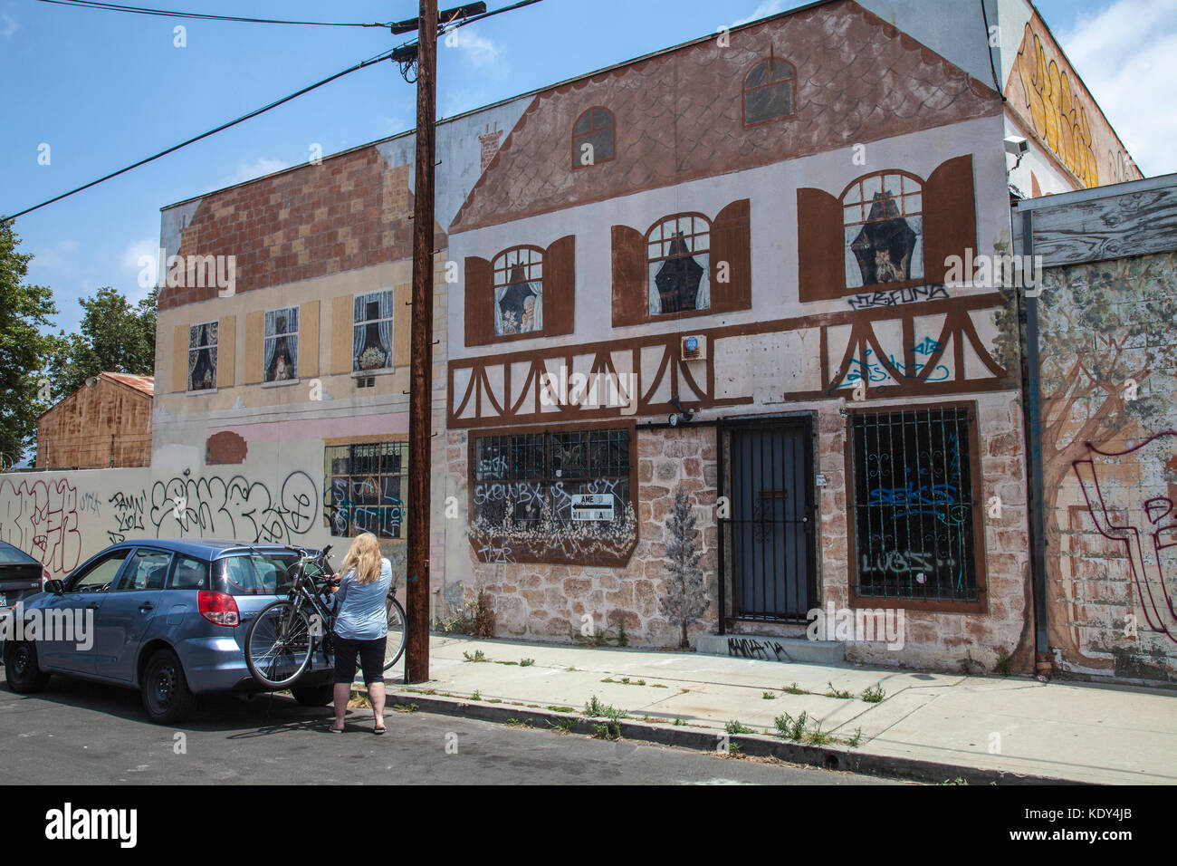 Houses painted on building near Los Angeles River, Elysian Valley, Los