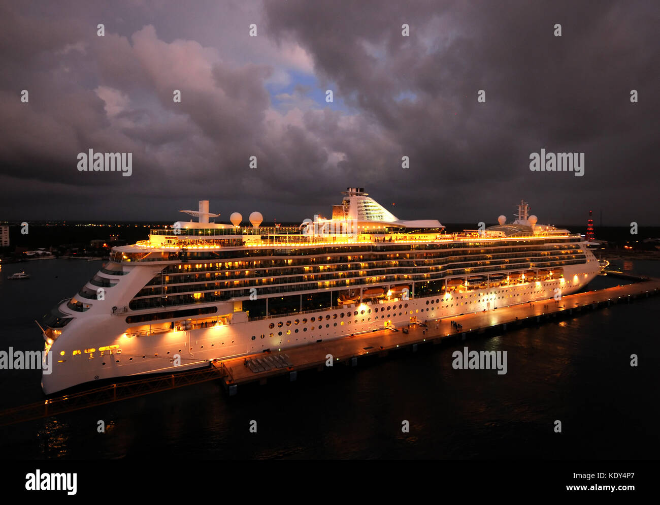Ocean liner brightly lit at night Stock Photo