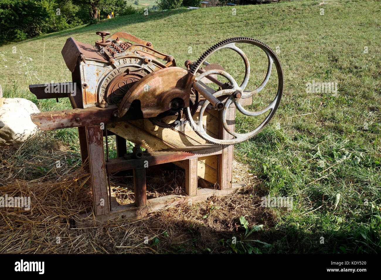 Old handdriven Threshing machine Stock Photo Alamy