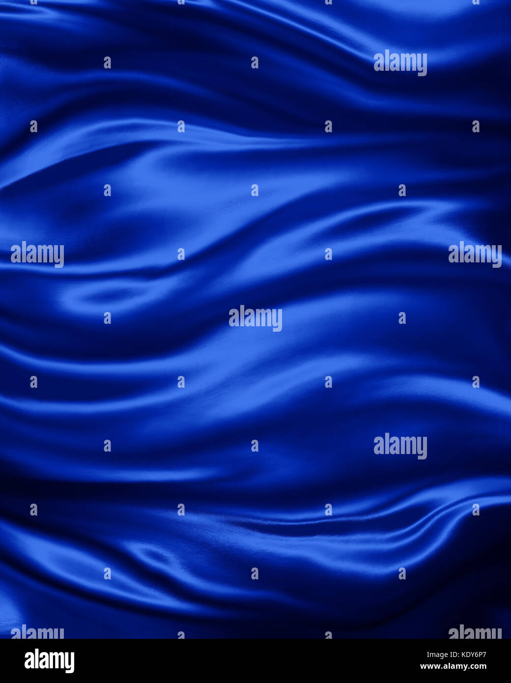 elegant luxury sapphire blue background with wavy draped folds of cloth, smooth silk texture with wrinkles and creases in flowing fabric Stock Photo