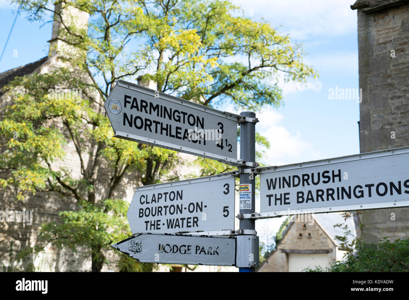 Cotswold directional road sign in the village of Sherborne, Gloucestershire. UK Stock Photo