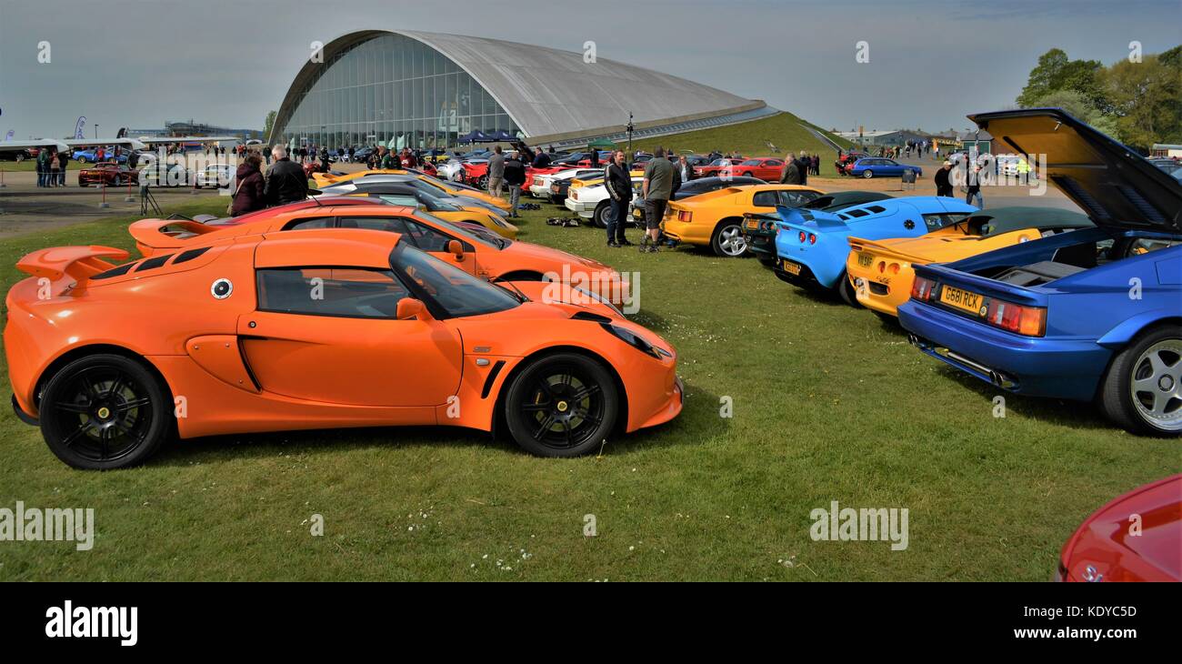 Rows of sports (lotus) cars lined up looking towards the American Stock
