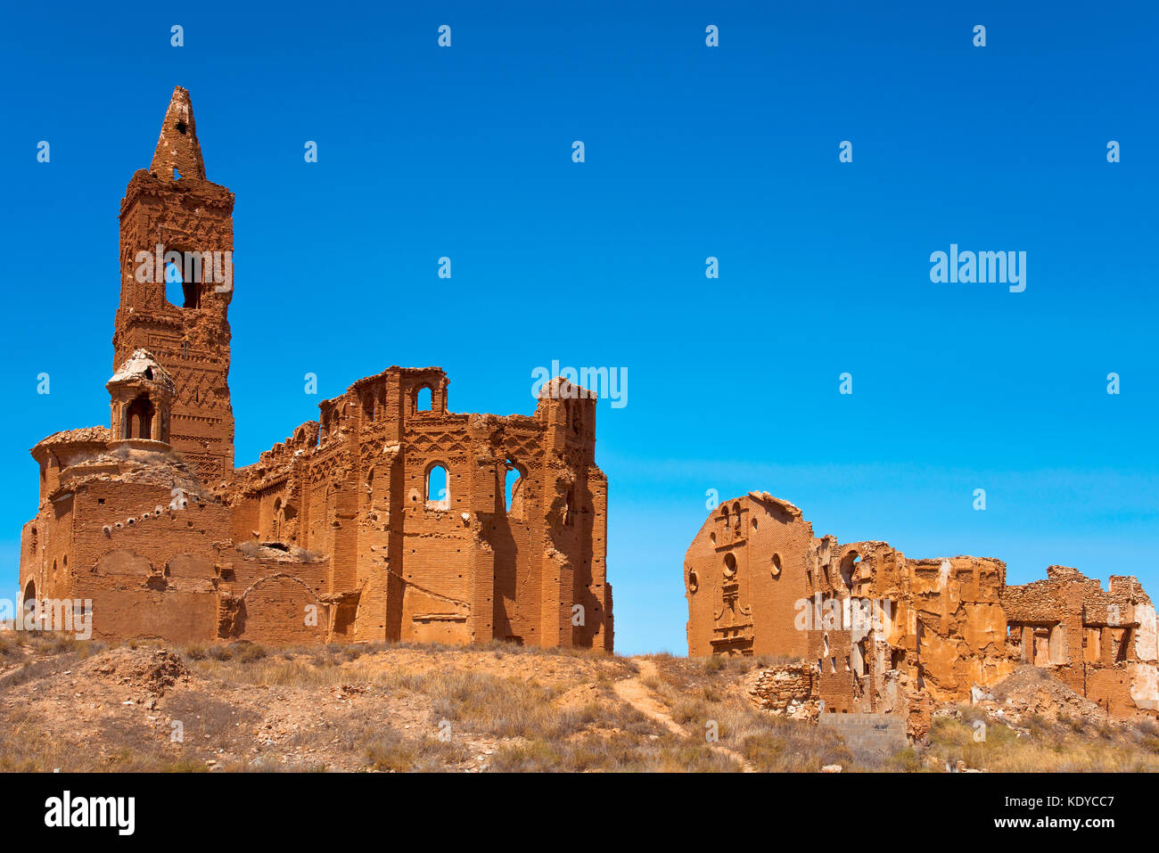 a view of the remains of the old town of Belchite, Spain, destroyed during the Spanish Civil War and abandoned from then, highlighting the San Martin  Stock Photo