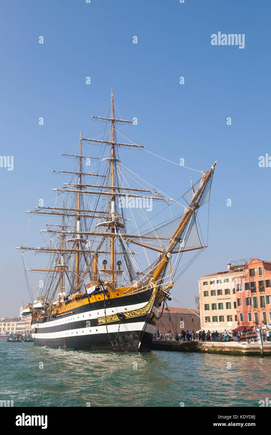 Amerigo Vespucci tall ship moored in Venice, Italy  in Castello. Commissioned in 1931 by the Italian navy it is used for training. Crowds of people wa Stock Photo