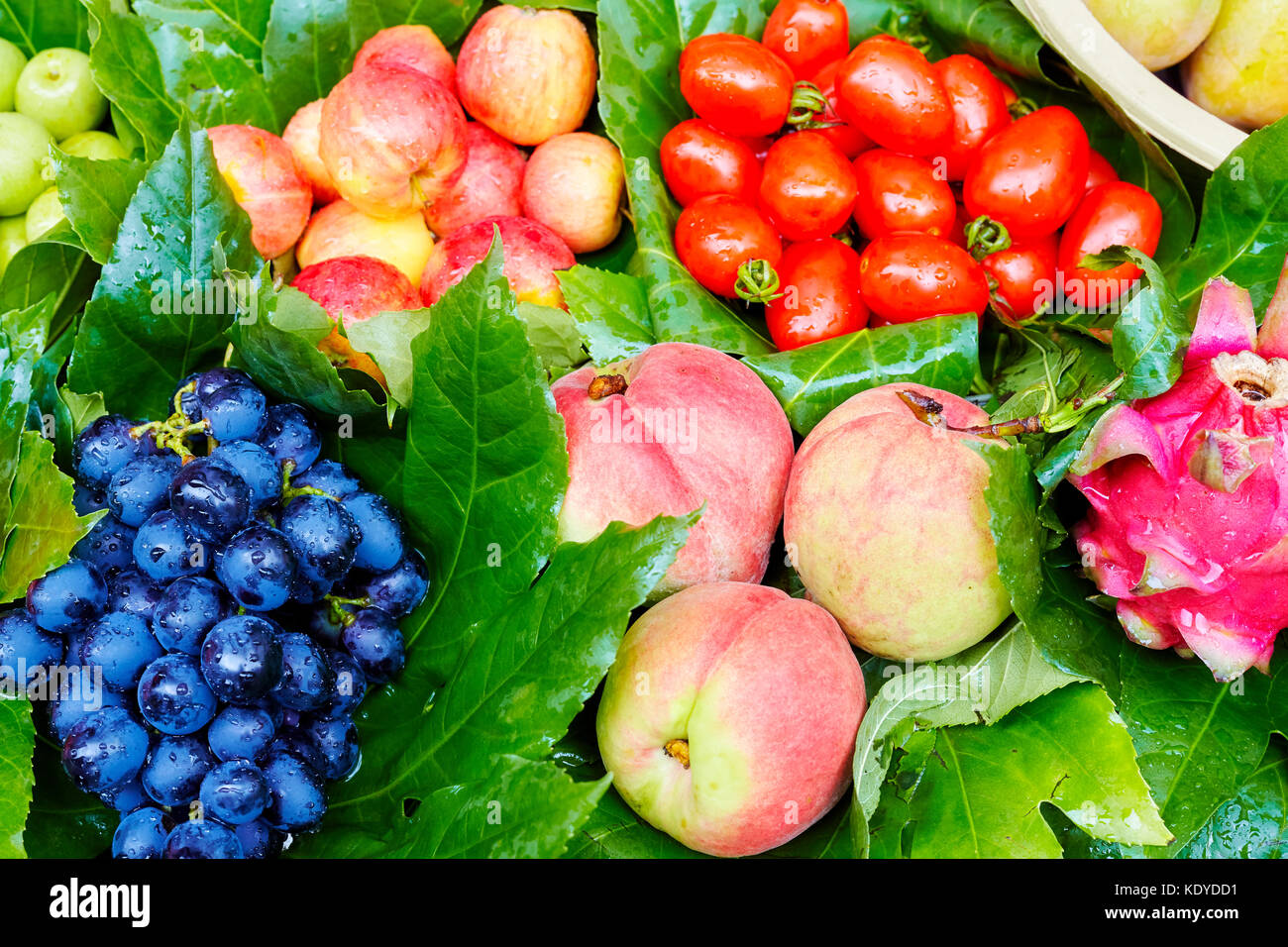 Fresh ripe and sweet fruits on local market, selective focus. Stock Photo