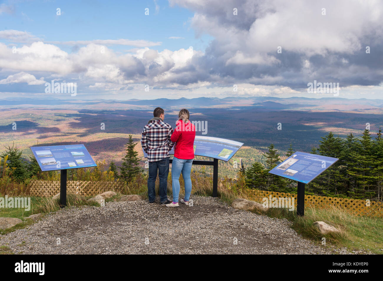 Two people standing at panoramic lookout on Saint Joseph Mount in
