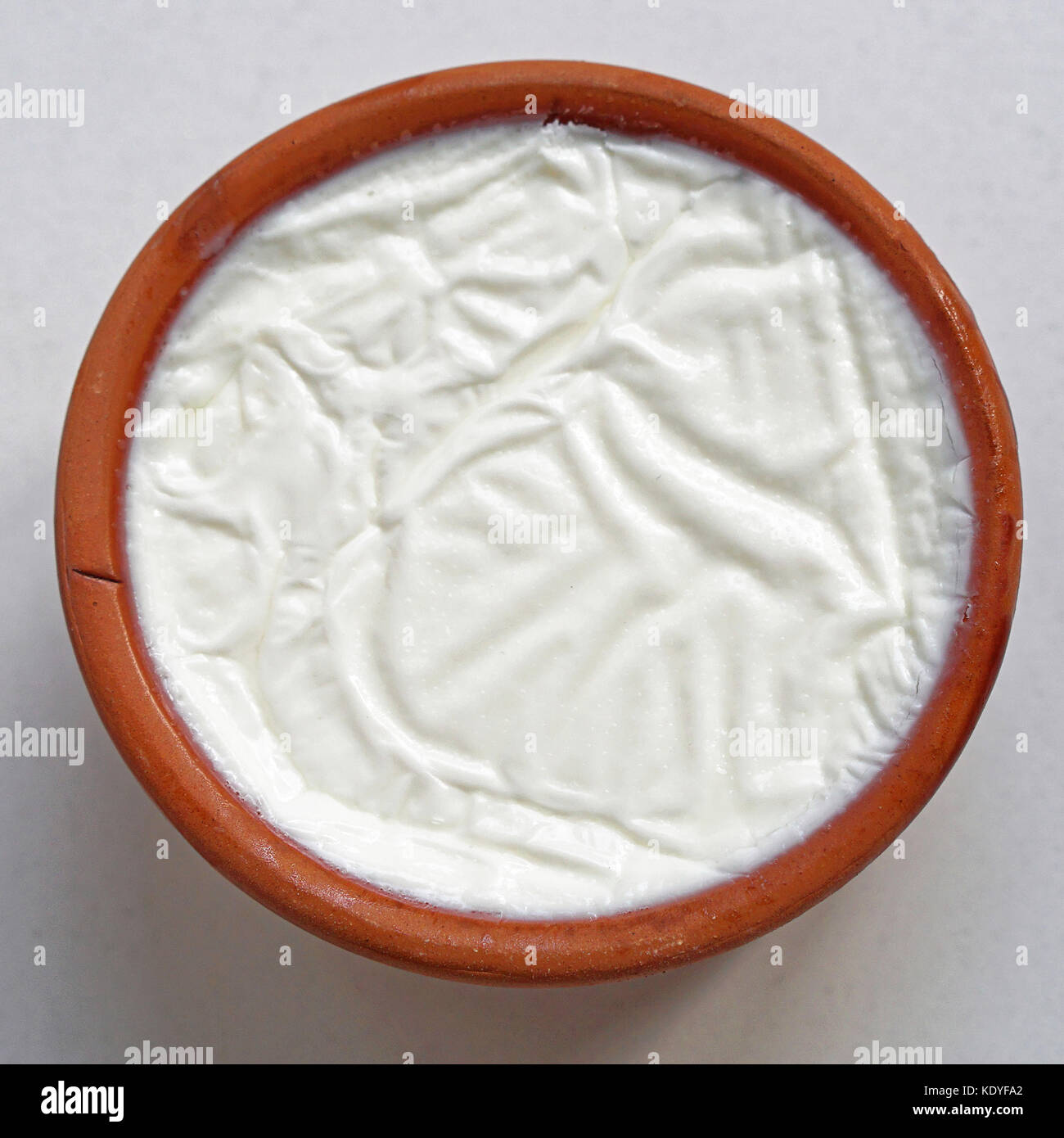 Greek style yogurt in pot Stock Photo Alamy