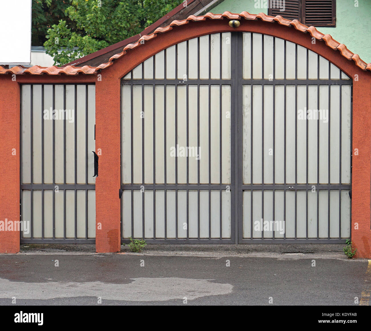 Arch gate and door home fence Stock Photo Alamy