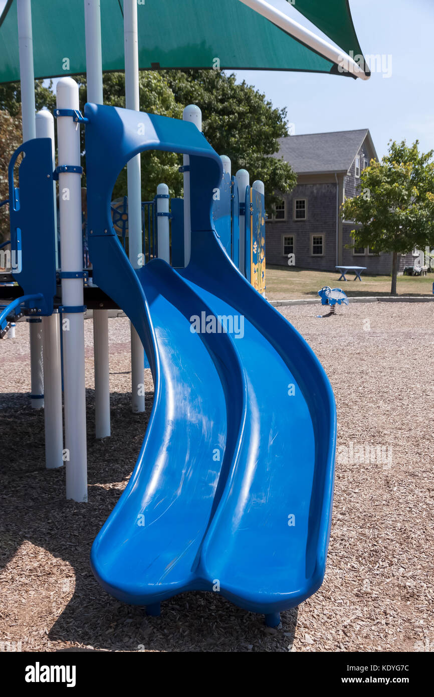 Polyethylene sliding board in a public park. Stock Photo