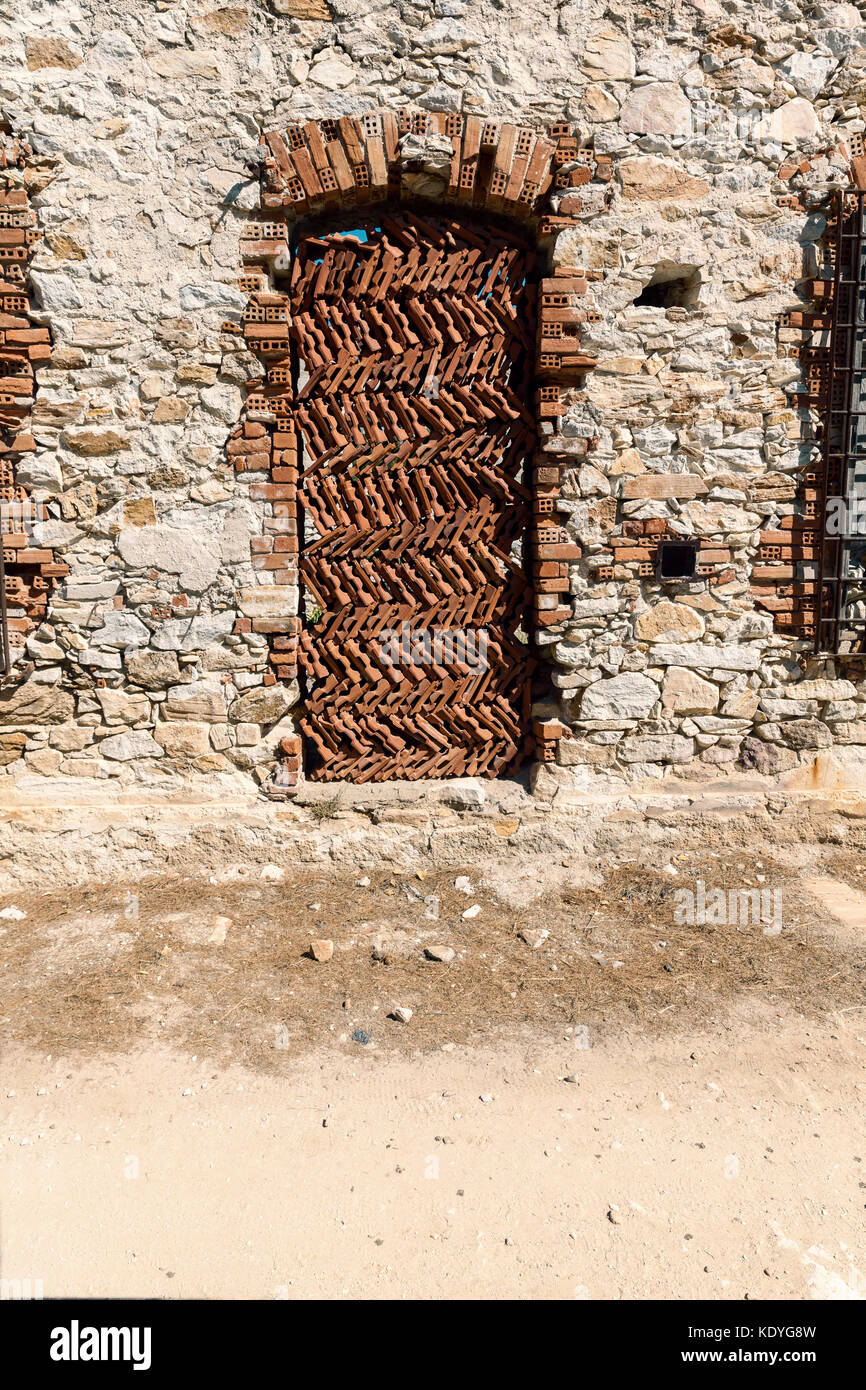 old stone wall with door Stock Photo - Alamy