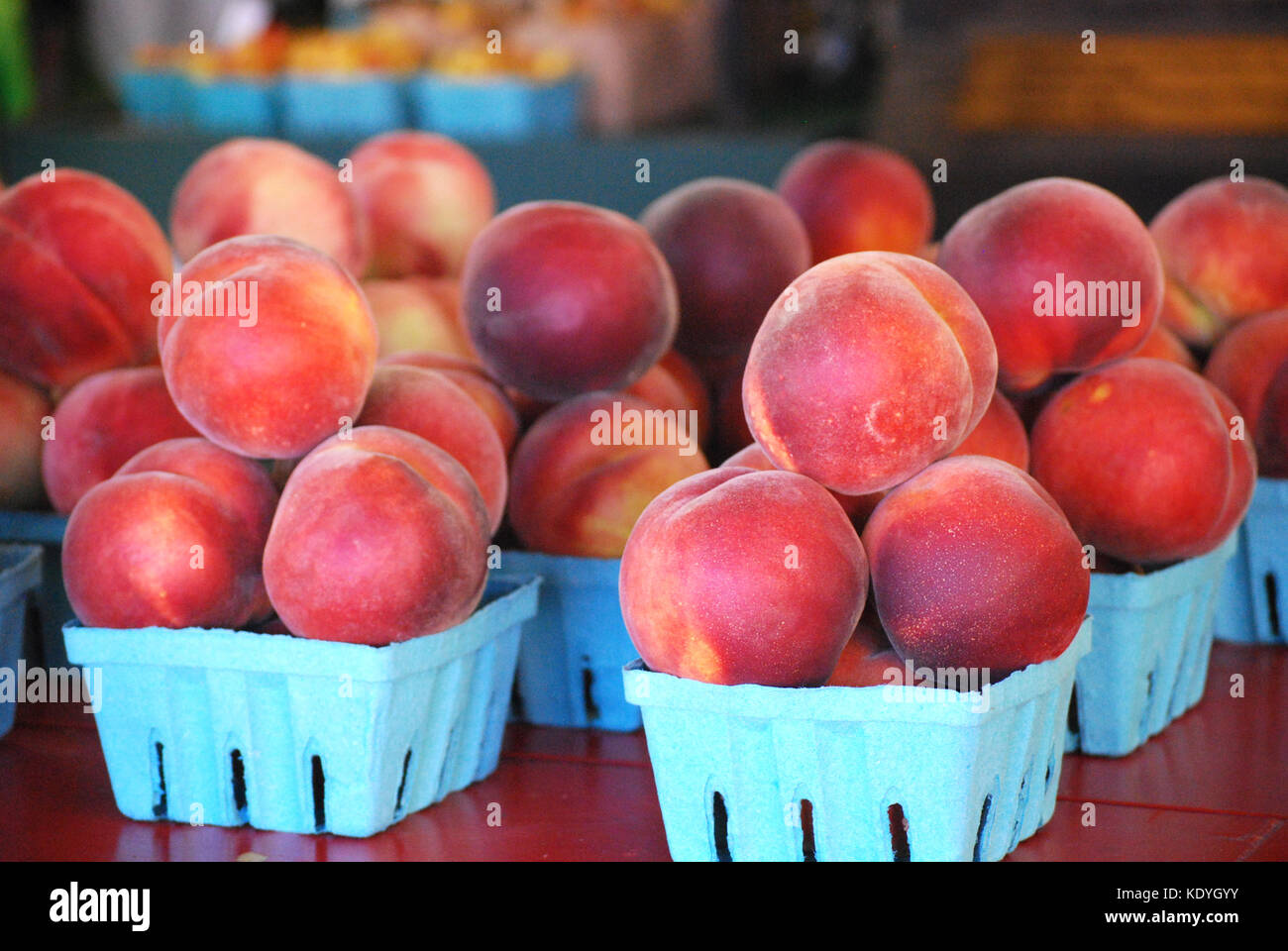 Baskets of fresh picked Peaches Stock Photo Alamy