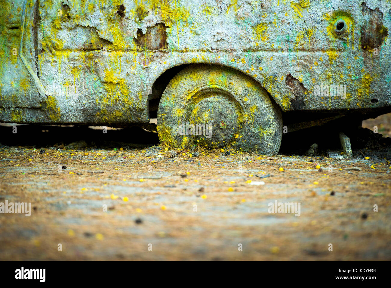 An old rusty car in paint from paintball Stock Photo - Alamy