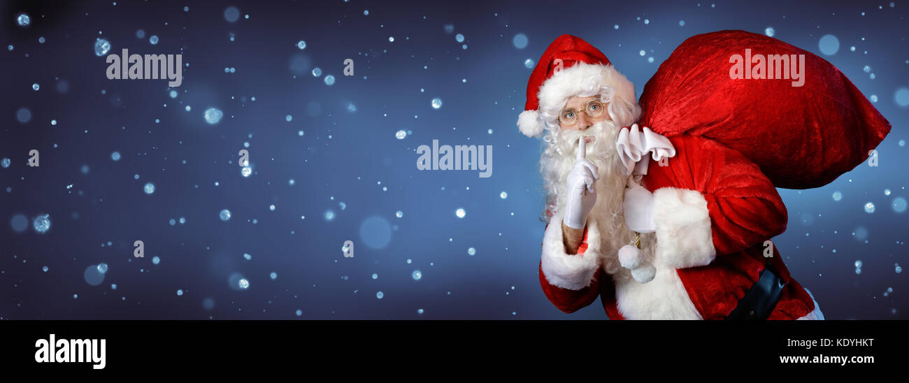 Santa Claus Carrying Bag In Night Stock Photo - Alamy