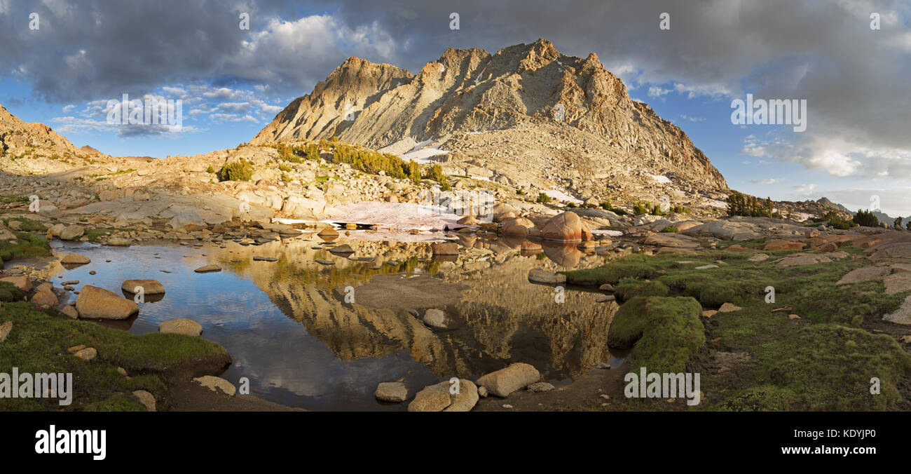 mountain reflection in a small lake on Darwin Bench in the Sierra Nevada Mountains Stock Photo